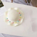 Children's straw hat and bag set in solid colour, large brim, dome top with cartoon pattern and hairy ball detail