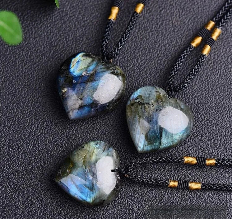 Blue labradorite moonstone heart of the ocean geometric pendant necklace on a chain.