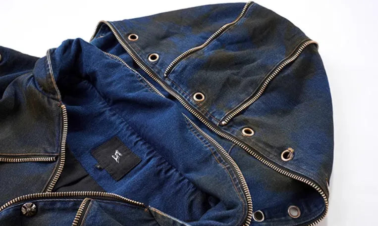 Blue hooded denim vest coat and matching trousers laid flat.
