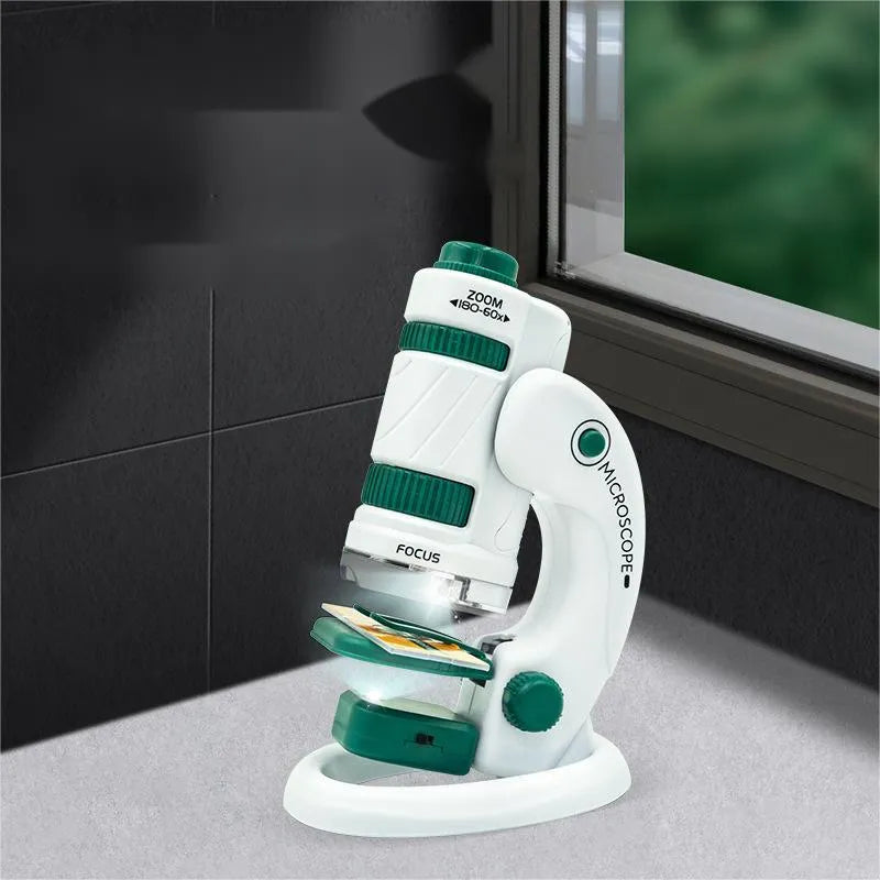 Portable microscope upgrade set with specimen slides in white and green plastic casing