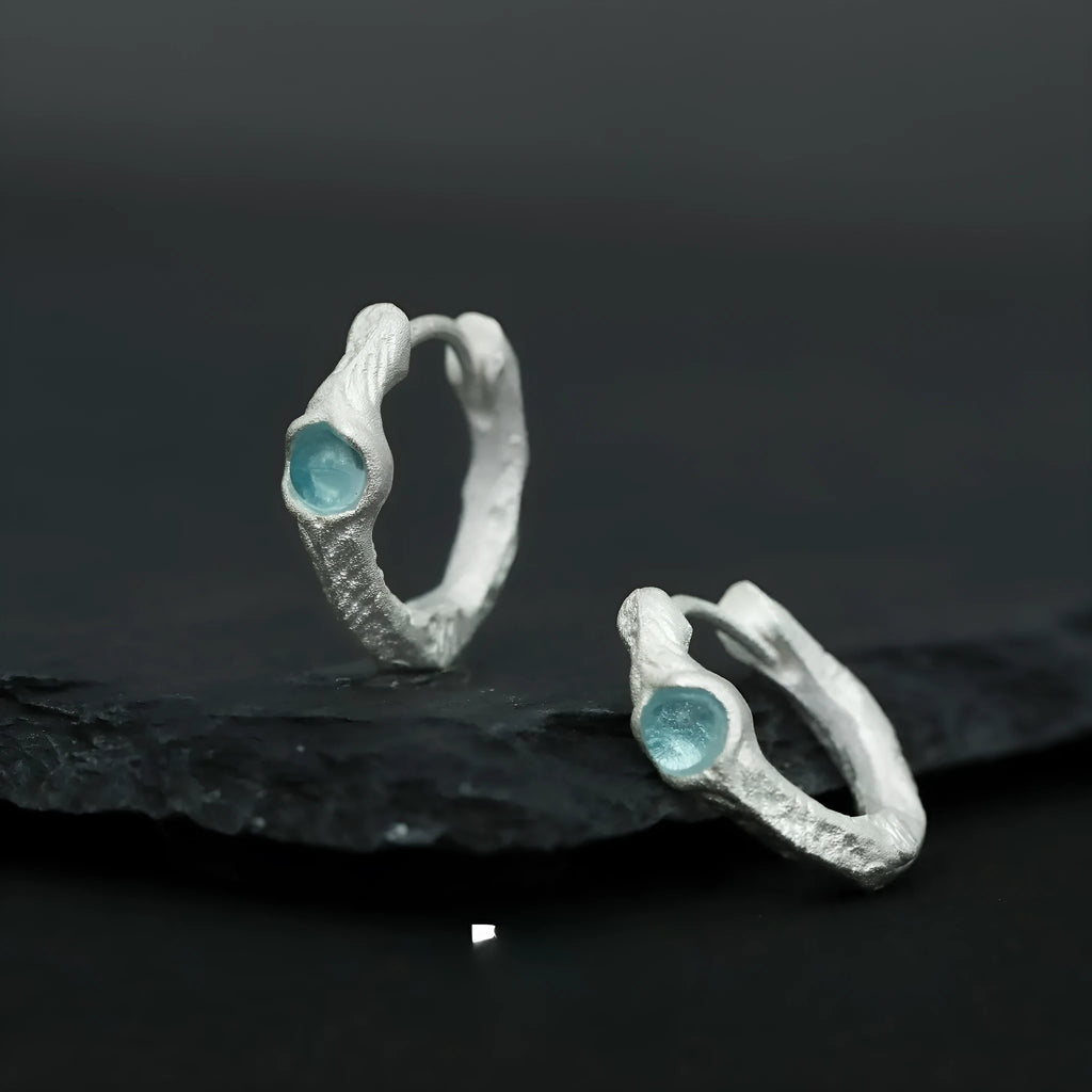 Geometric round ear clip in burnt silver electroplated finish made from 925 sterling silver