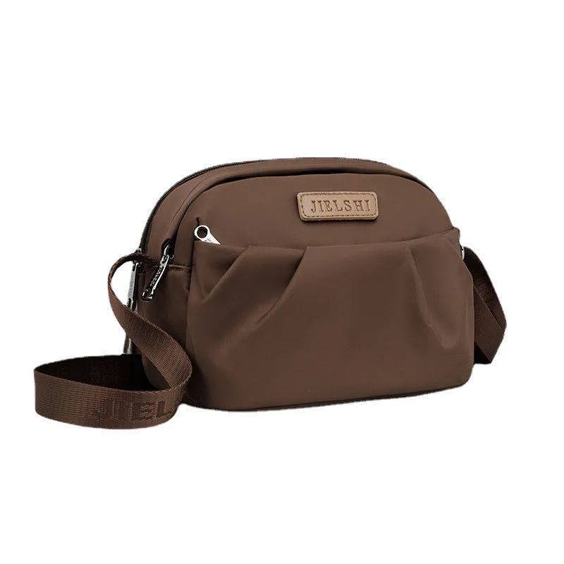 Pleated oxford cloth messenger phone bag with zip compartments in ten colour options