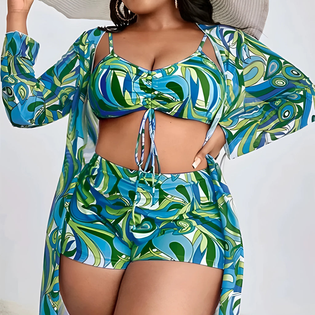 Women's floral print bikini three-piece set with bra, briefs, and a matching cardigan cover-up.