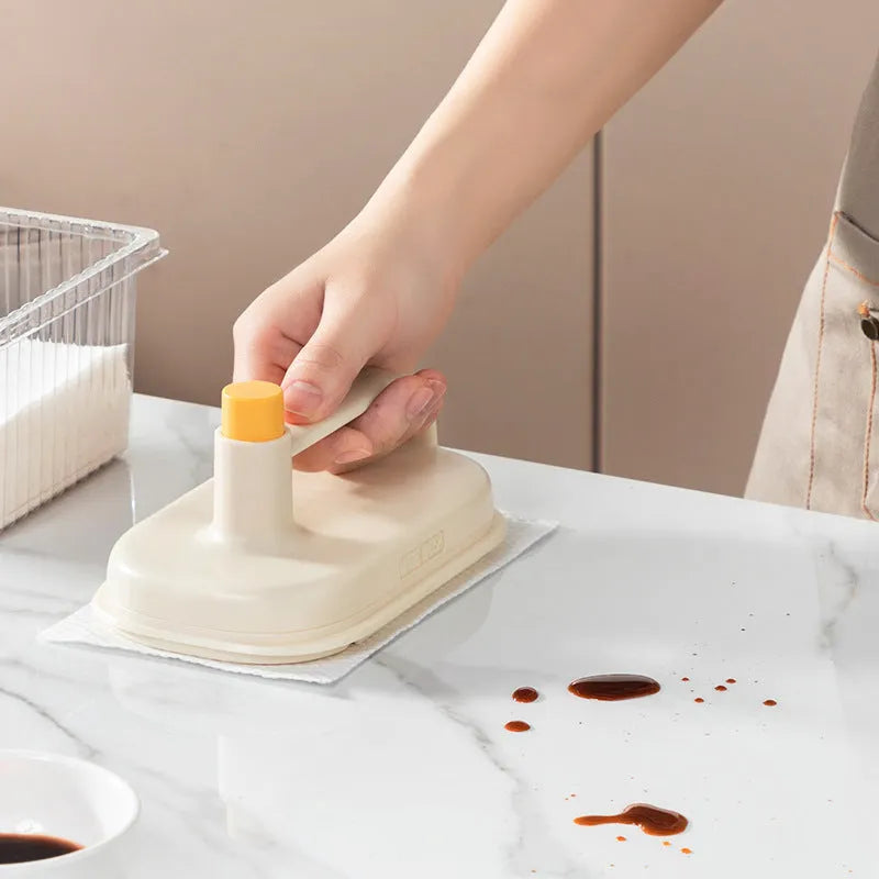 Magic Brush disposable dusting tool with plastic handle and white non-woven rags for cleaning