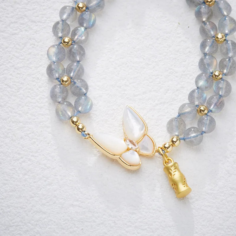 Grey moonstone woven bracelet with butterfly knots and geometric retro design