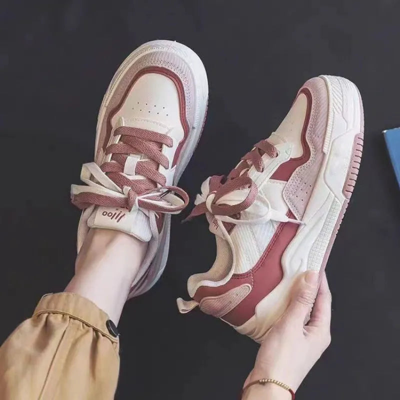 Women's pink spring sneakers with low top design and rubber sole