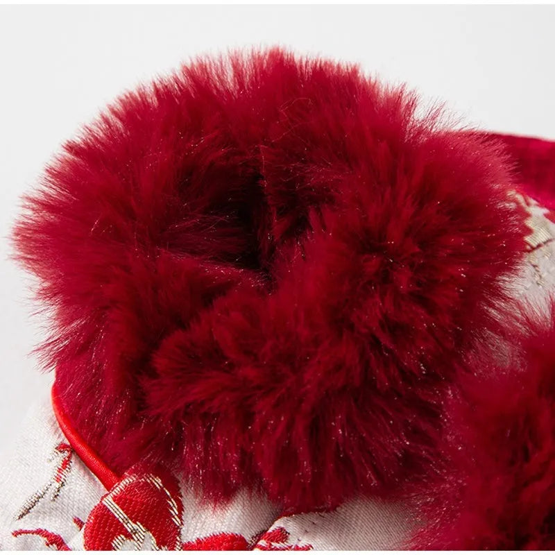 Chinese-style pet Tang Suit jacket in red with stand-up collar and fluffy trim on small dog