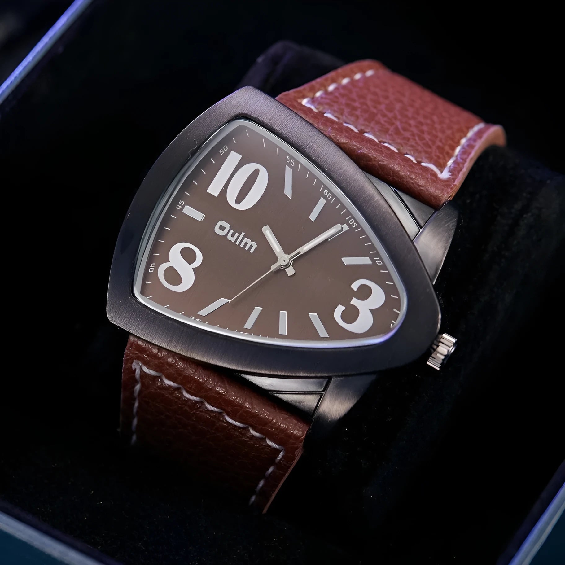 Men's casual watch with a geometric triangle-patterned strap and slim case, shown in brown, black, and blue colour variants.