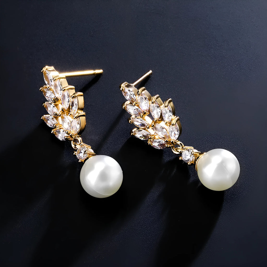 Geometric flower earrings with micro inlaid zircon and pearl details in gold, platinum, or rose gold finishes