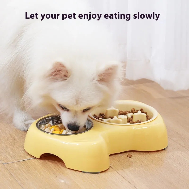 Two-in-one stainless steel slow feed cat bowl with large and small eye compartments, anti-choking design, in blush pink