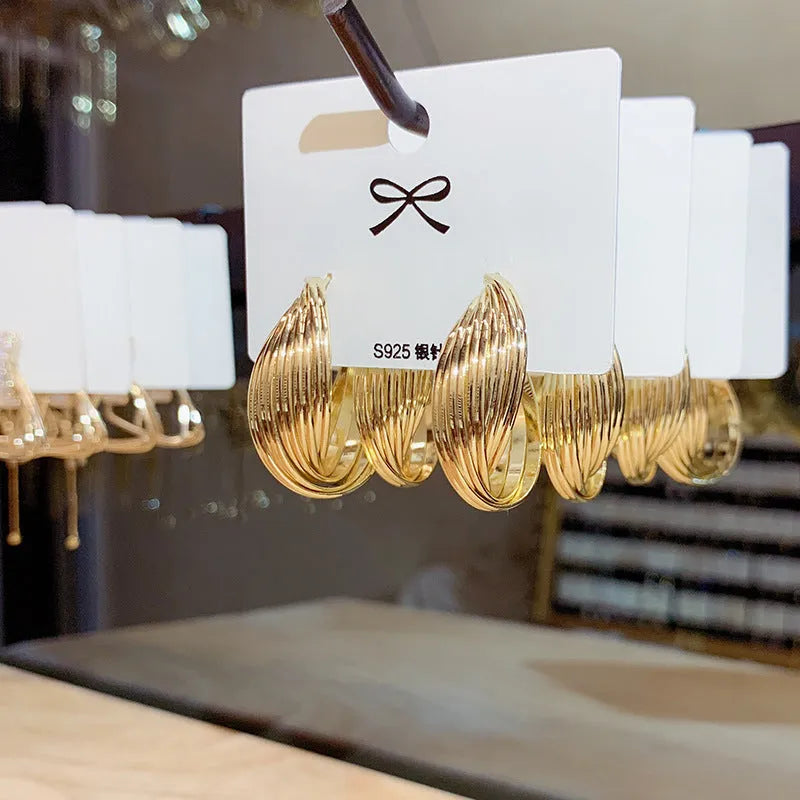 Twisted metal eardrop earring real gold plated round geometric drop earring gold colour stranded multi-layer design