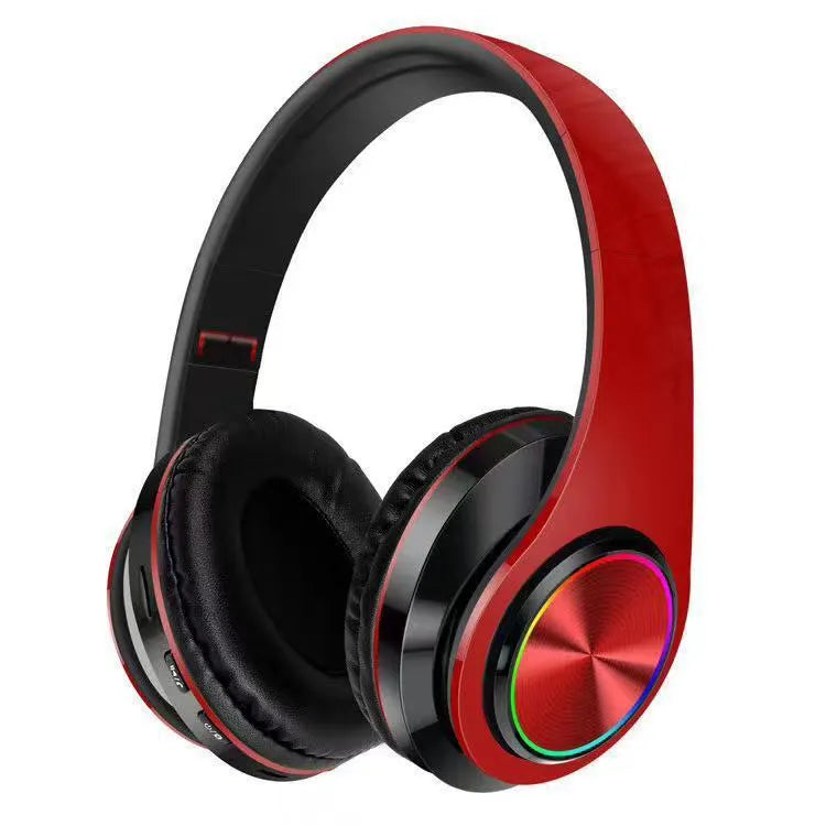 Black wireless over-ear gaming headset with breathable light on earcup.
