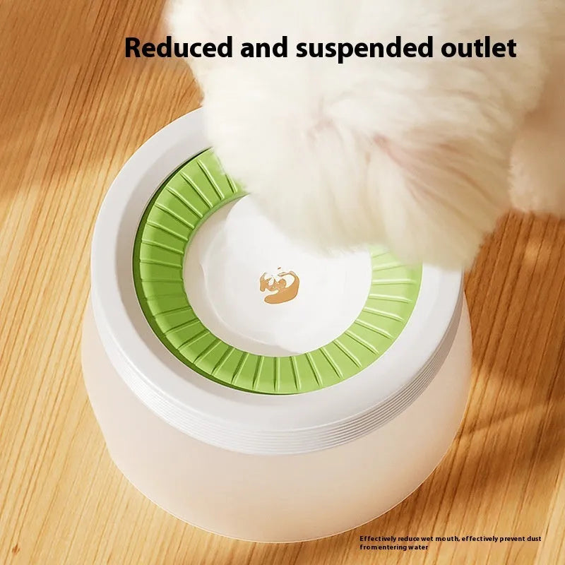 Suspended green pet water bowl for dogs and cats on a white plate base.