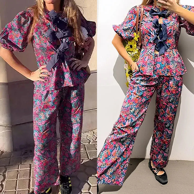 Floral print trousers suit with tie-neck puff sleeve blouse and matching trousers