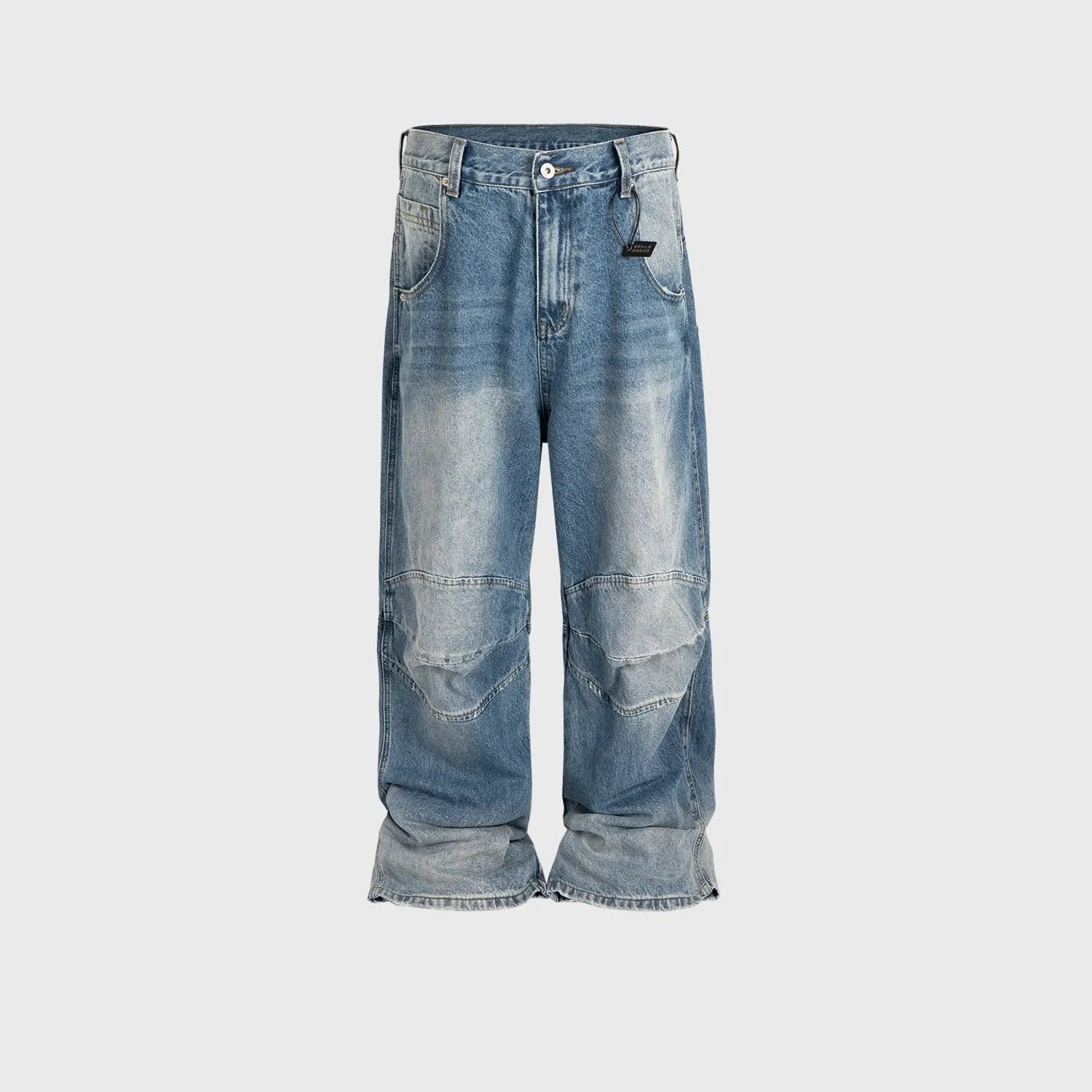 Baggy blue jeans with front pleats and a straight leg, shown in a washed denim finish.