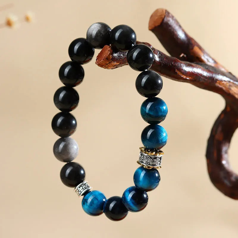 Handmade geometric bracelet with peacock blue Tigereye stone beads in ethnic style