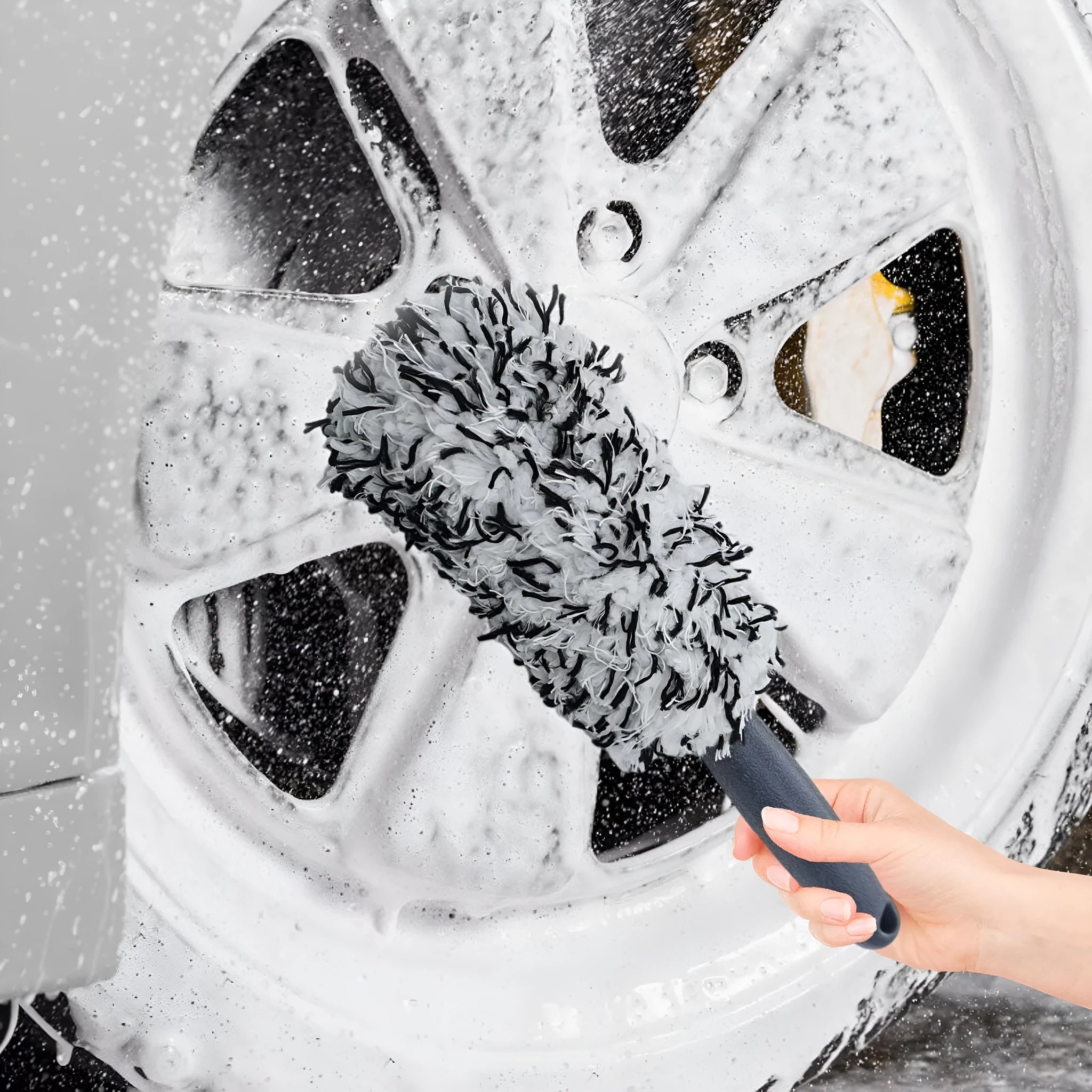 Long handled car wash brush with blue ultra-fine fibre head for cleaning wheels and body panels.