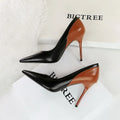 Retro women's black high heels with stiletto heels and pointed toes for banquet events