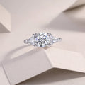 Ocean Diamond 2-carat moissanite wedding ring set in gold-plated S925 silver on a white background