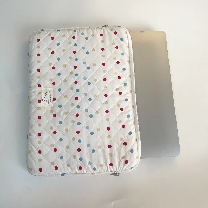 Polka dot women's laptop bag with storage compartments available in three size options