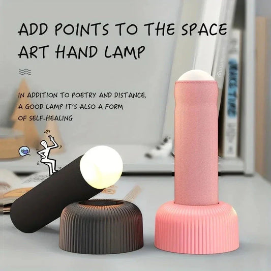 Innovative handheld LED night light with soft, fabric-like texture and soothing warm glow for a cozy, tranquil atmosphere