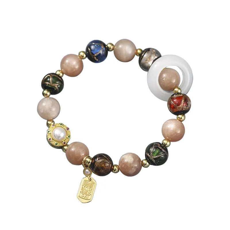 Hand-woven fragrant grey coloured glaze bracelet with natural stone beads on wrist