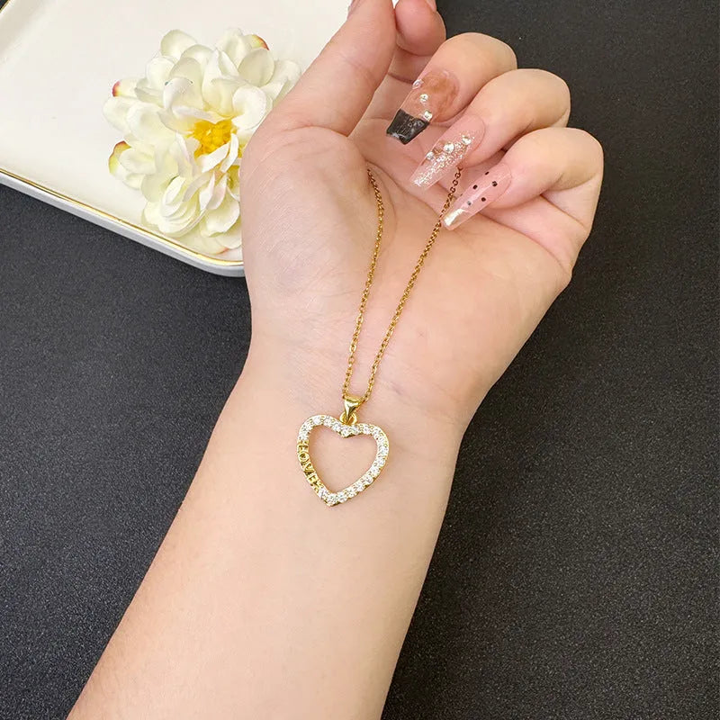 Heart-shaped copper alloy necklace and ear studs set with electroplated finish, O-ring chain, and butterfly design