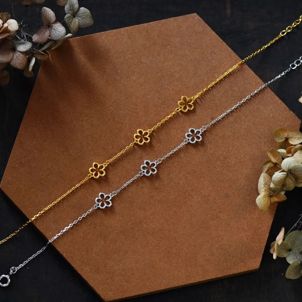 Women's S925 sterling silver bracelet with floral pattern and heart shapes in white gold or golden colour