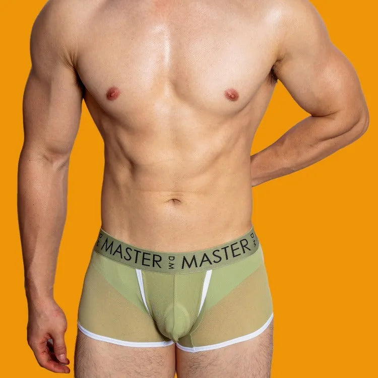 Men's low waist ice silk shorts in solid colours like army green and black, laid flat.