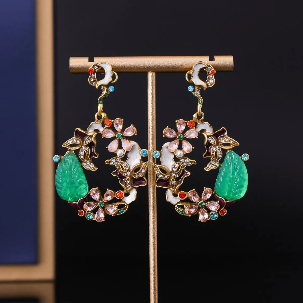 Light luxury distressed alloy earrings with diamond-embedded resin flower and Chinese style garland eardrop design