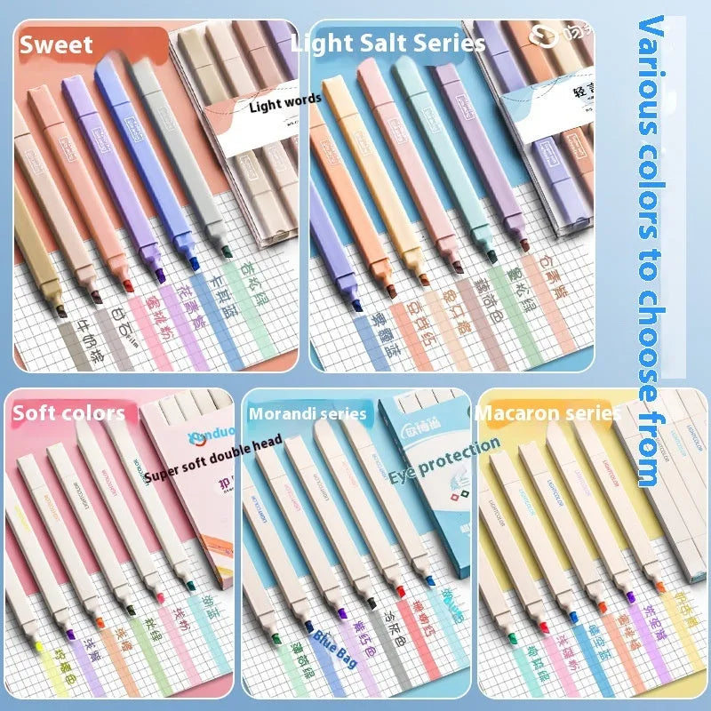 Set of double-ended fluorescent highlighting pens in mixed colours on a white surface.