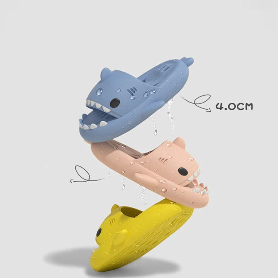 Shark-inspired shower slides with drain holes, featuring authentic shark design details and quick-drying EVA material