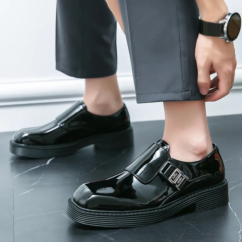 Men's glossy black PU leather loafers with a hidden low heel platform sole.
