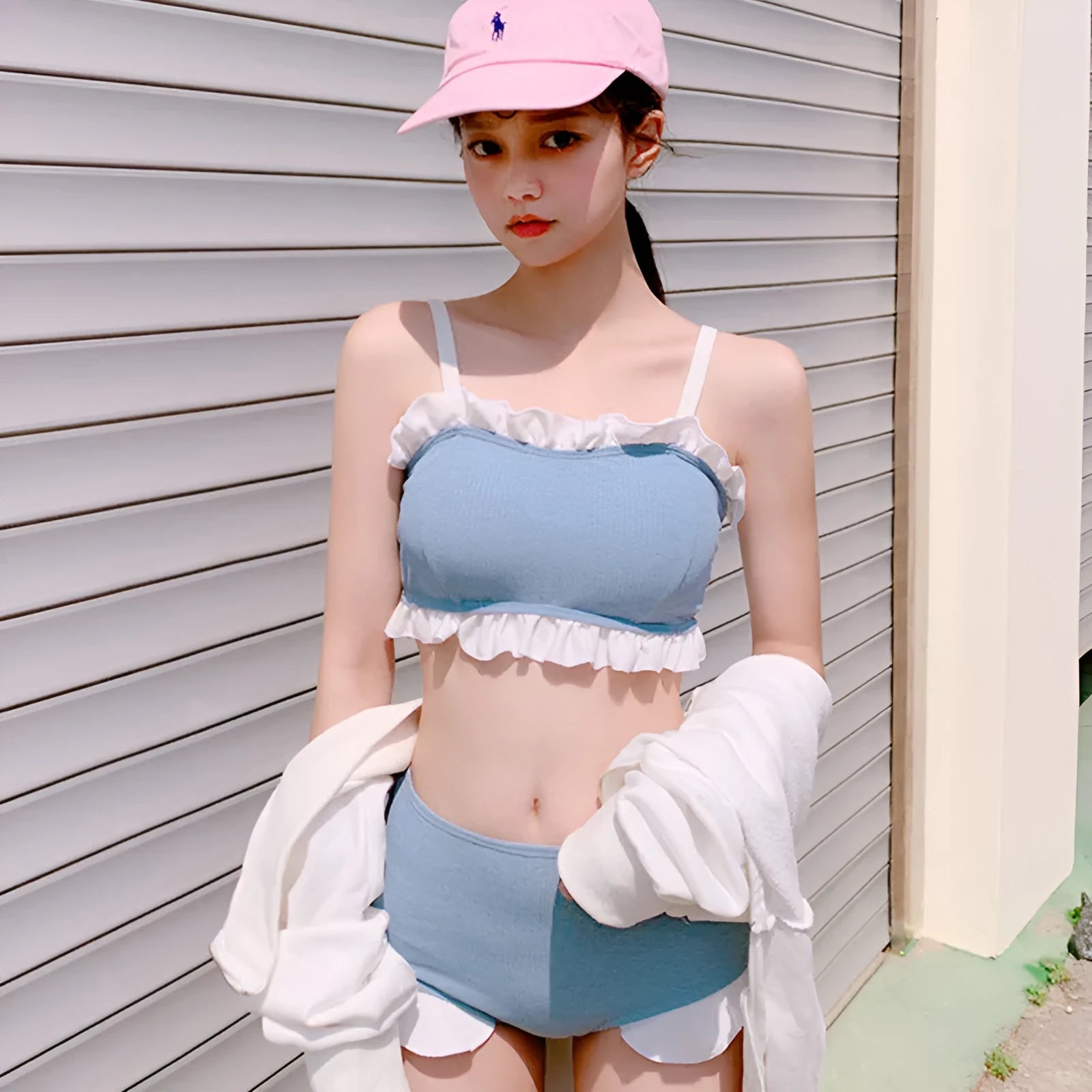 Women's solid colour one-piece swimsuit with split suspenders design in conservative cut