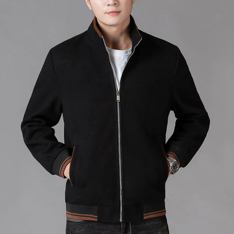 Men's grey polyester fleece jacket with zip front, long sleeves, and a chest pocket, shown on a hanger.