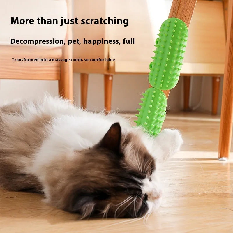 Silicone cat grooming comb with adjustable strap mounted on a table leg.