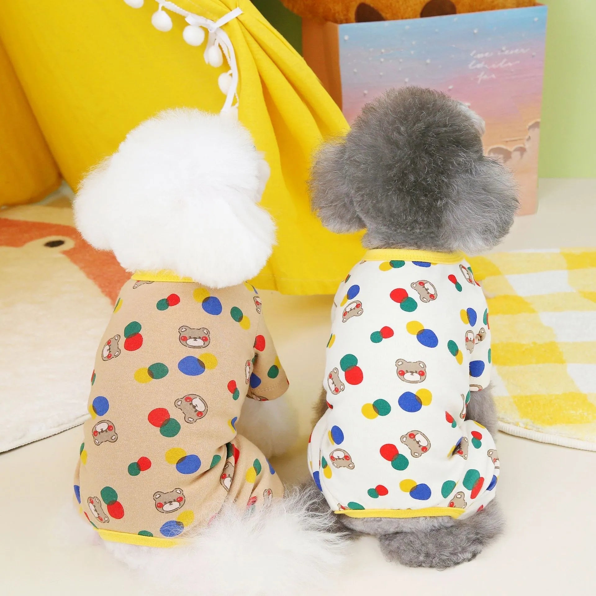 Beige dog jumper with colourful ball bear pattern, showing casual cotton spandex construction.