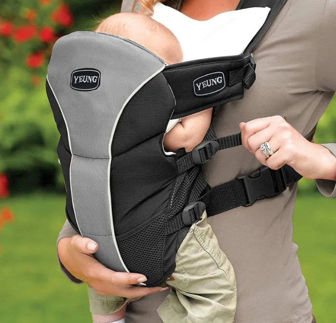 Double-shoulder baby carrier in red colour showing front-facing infant carrying position