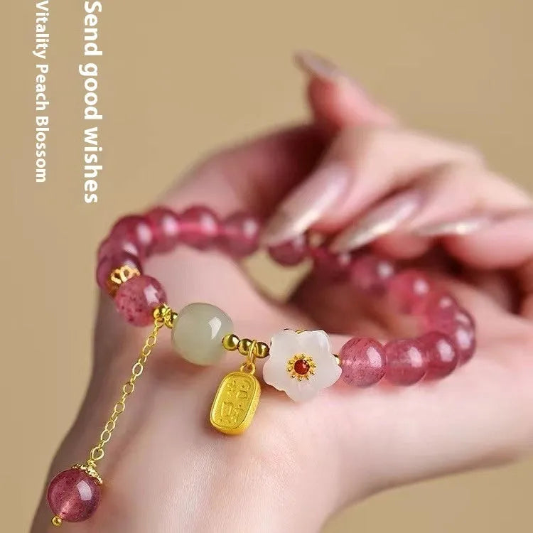 Handmade strawberry quartz crystal bracelet with Hetian jade peach blossom decoration and various charm styles