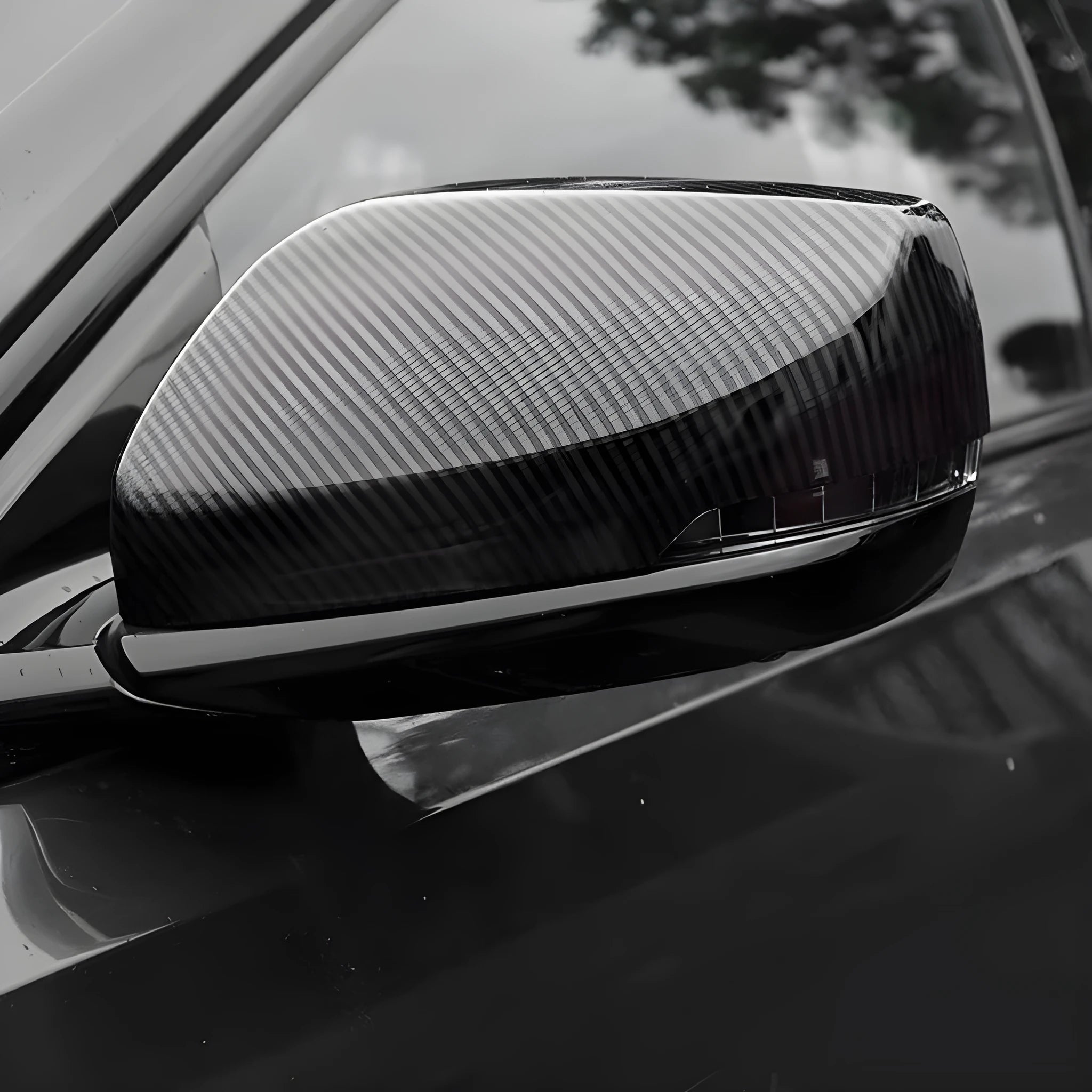 Set of ABS plastic mirror covers for Cadillac CT5 CT6 in carbon fibre, silver, and rain frame styles.