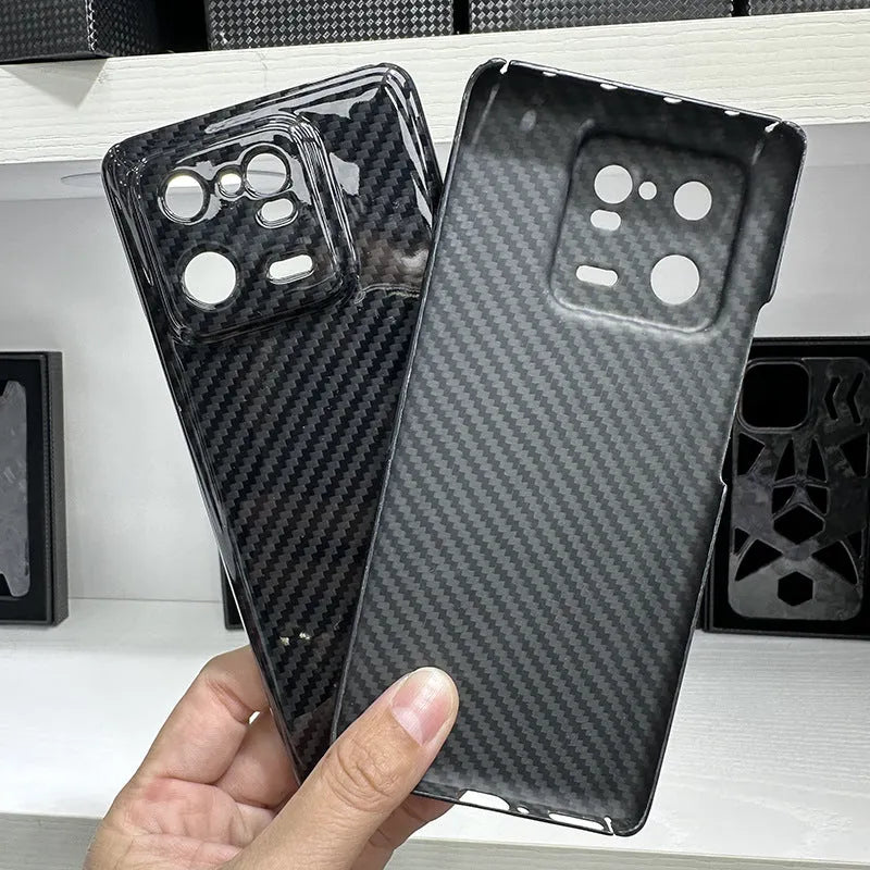 Ultra-thin 600D aramid fiber hard phone case for Xiaomi 13 and 13 Pro in matte black, bright black, or bright silver.