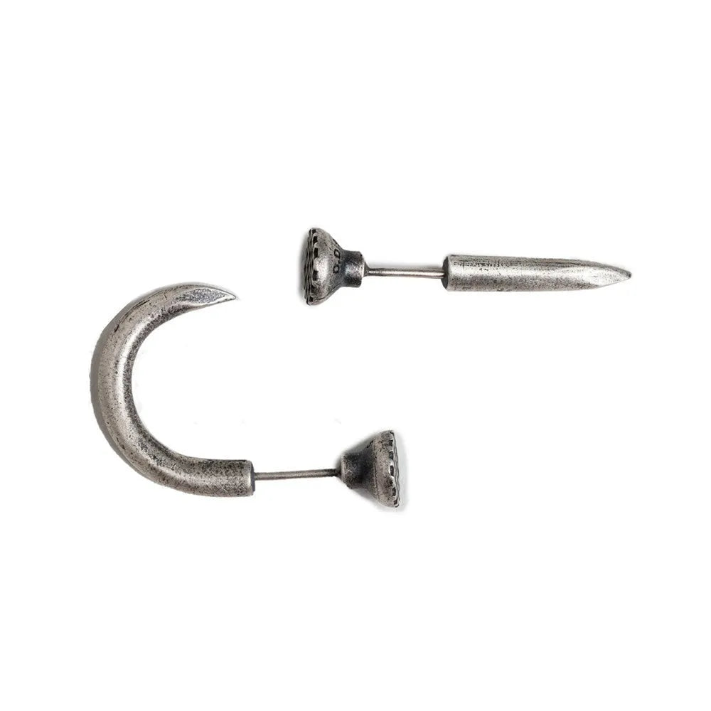 Sterling silver nail-shaped stud earrings with punk retro design