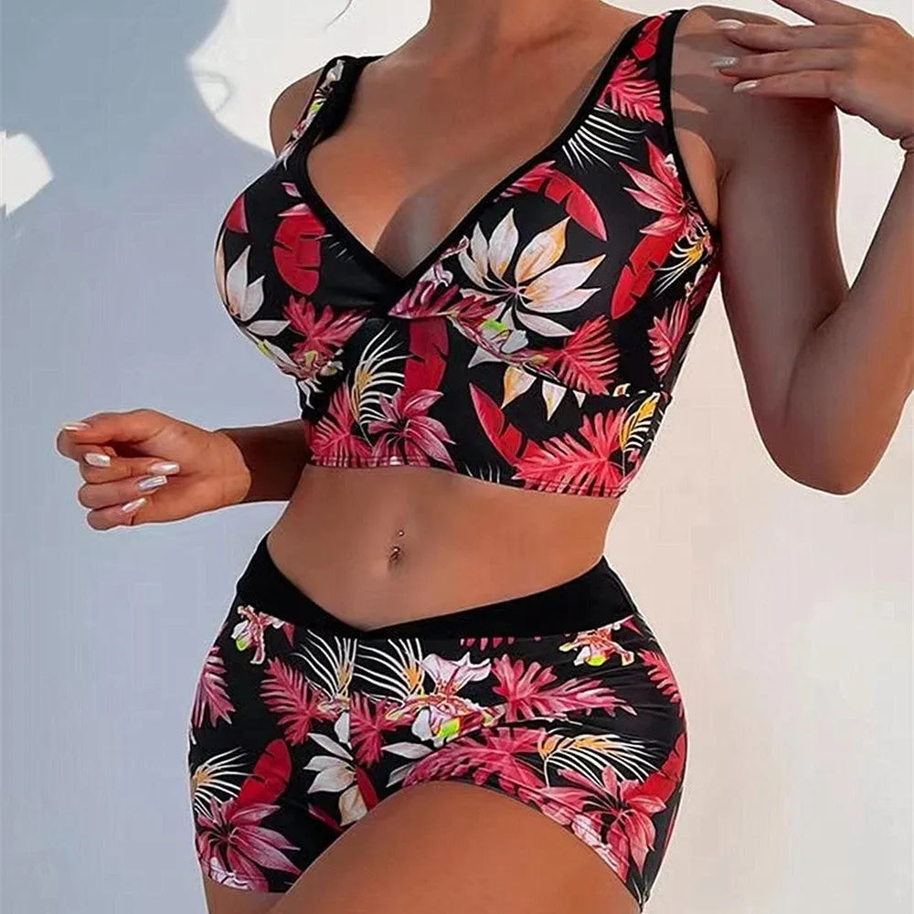 Women's two-piece swimsuit set with printed boxer-style briefs and sleeveless top in a multi-colour design.