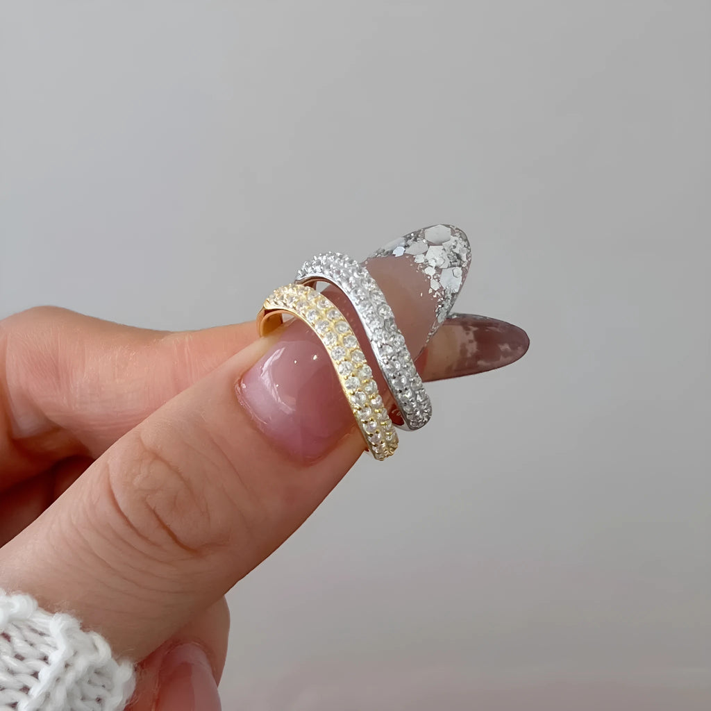 S925 sterling silver snake-shaped ring with zircon inlay, platinum electroplated finish on display