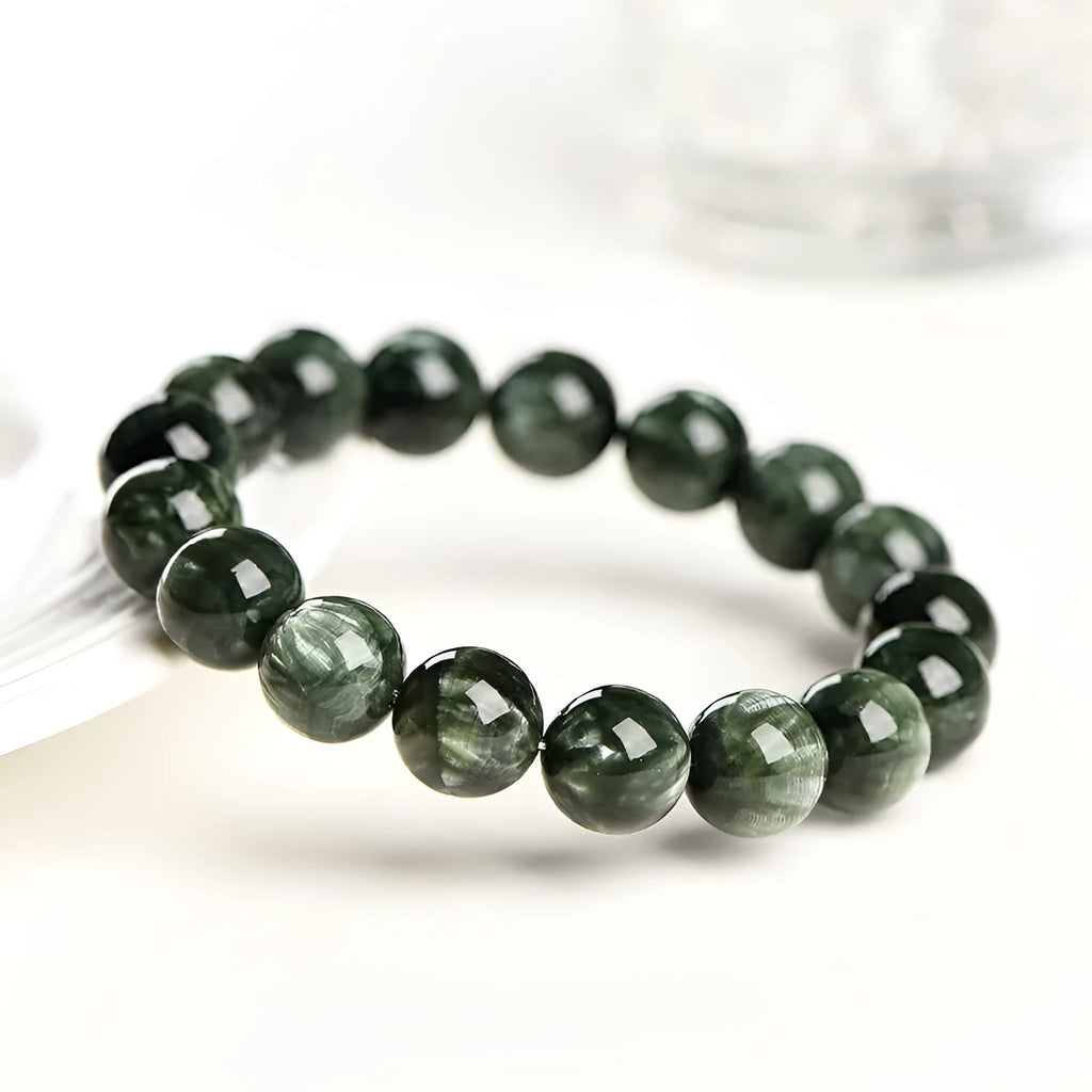 Natural green dragon crystal bracelet with round beads and traditional ruyi design elements