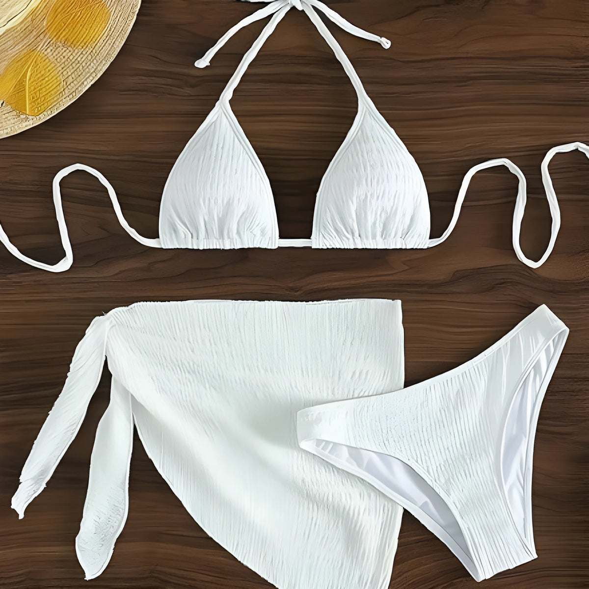 White lace-up split bikini swimsuit three-piece set with spandex fabric on woman at beach