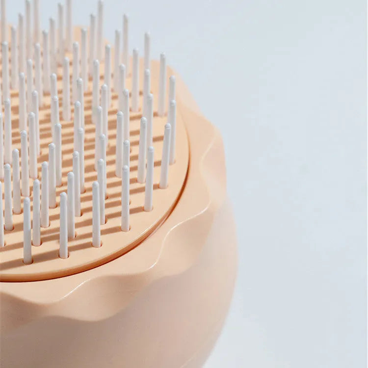 Floating massage pet needle comb with soft silicone brush head in orange pink and baby blue for cat hair cleaning
