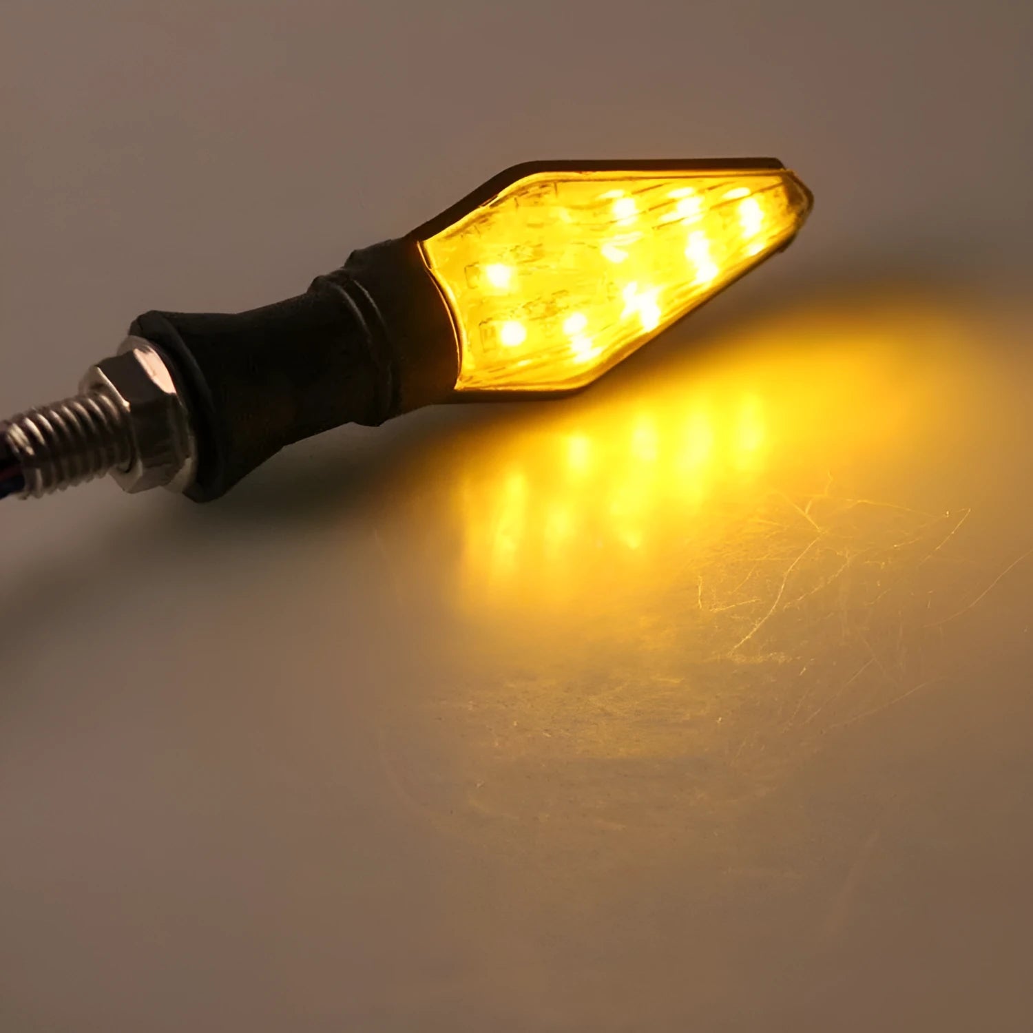 Motorcycle plastic LED turn signal indicator with double-sided luminous design in yellow and blue light options