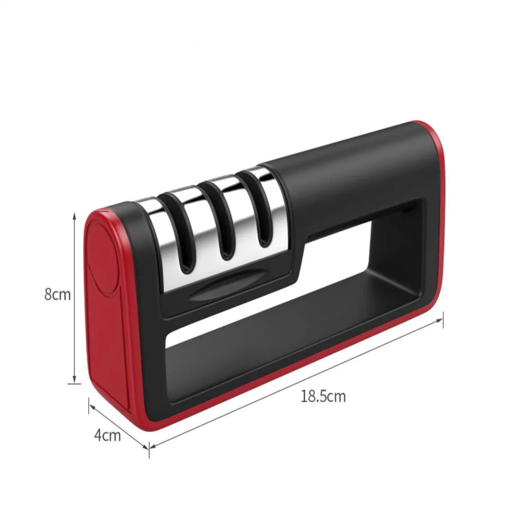 Black and red three-stage manual knife sharpener with rubber feet on base