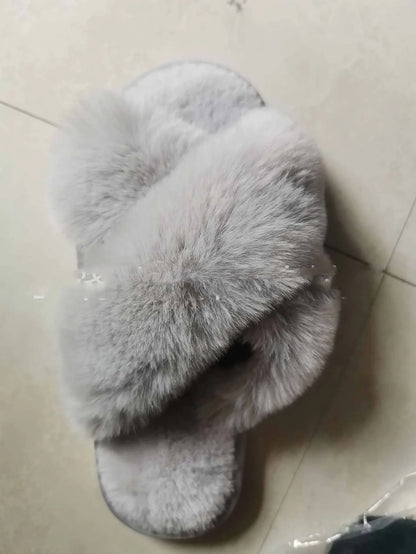 Plush faux fur slippers in various colors for cozy indoor comfort and style